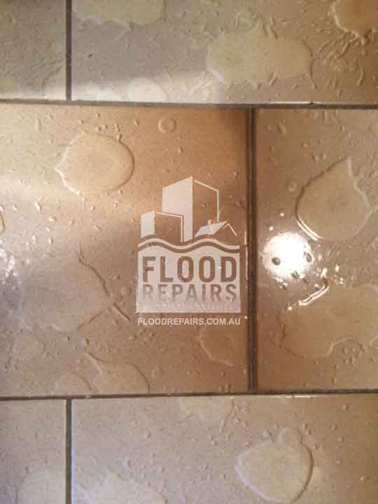 North-Fremantle flooded floor before flood repairs working 